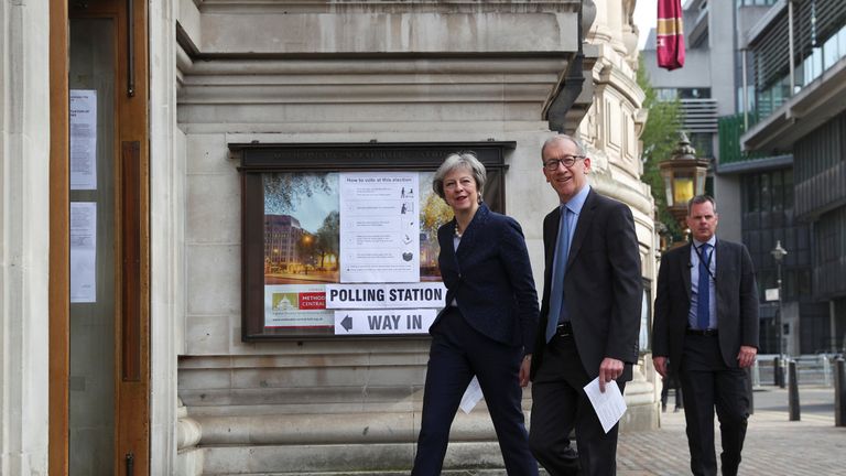 Theresa May and her husband Philip arrive to vote in local government elections in London