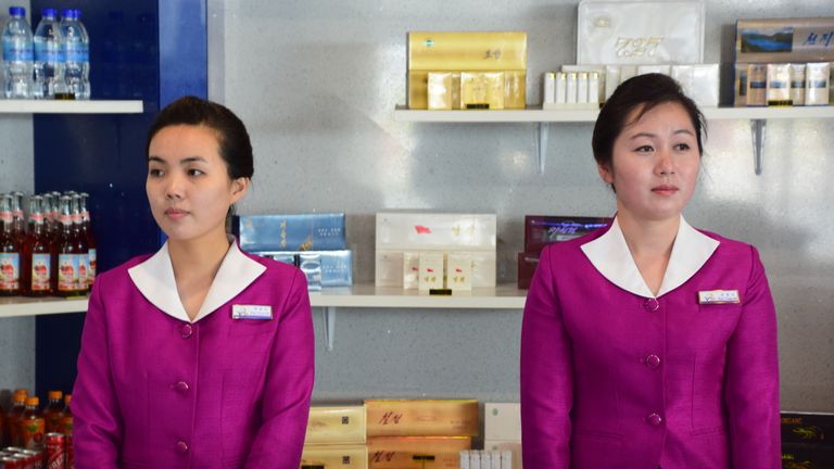 Two North Korean women at an airport kiosk in Wonsan. Pic: Michael Greenfield