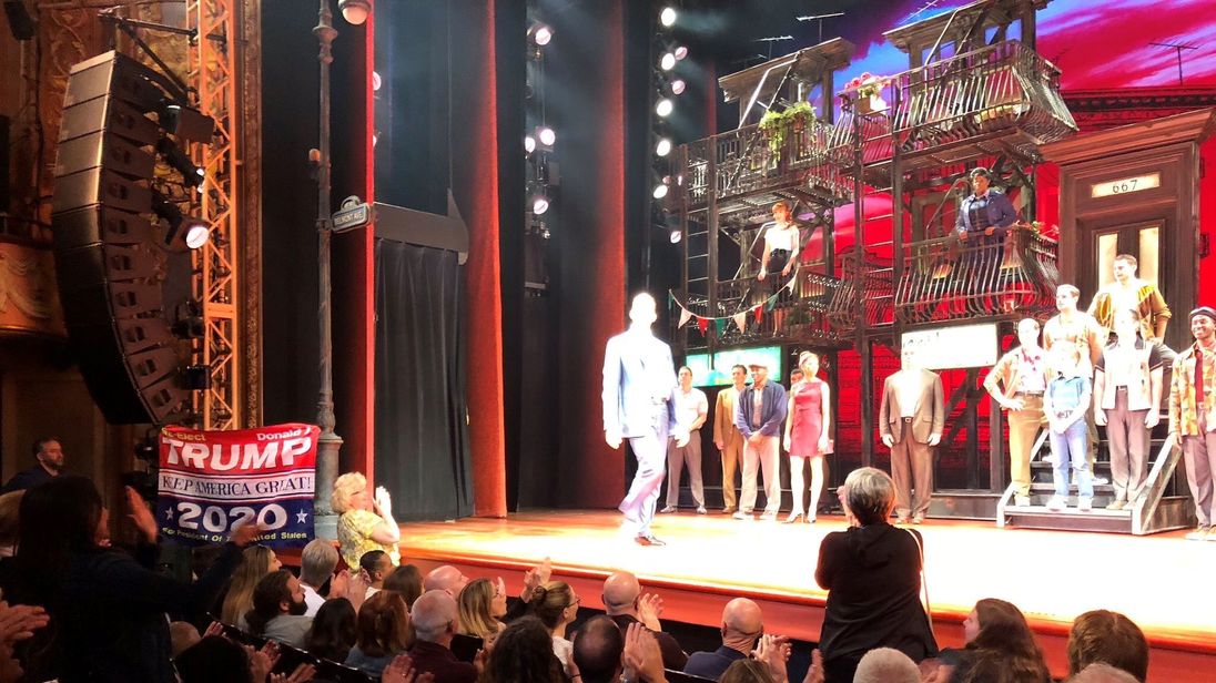 Trump supporter disrupts De Niro's musical with 'Keep America Great' flag