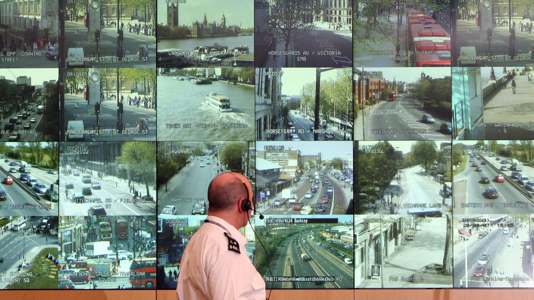 LONDON - APRIL 20: A police officer watches banks of television monitors showing a fraction of London's CCTV camera network in the Metropolitan Police's new Special Operations Room on April 20, 2007 in London, England. The new high tech operations room, believed to be the largest of its kind, is set to be the focal point for the policing of any large event or operation in London and is designed to handle public order events and major incidents, the Special Operations Room will kick off with the 