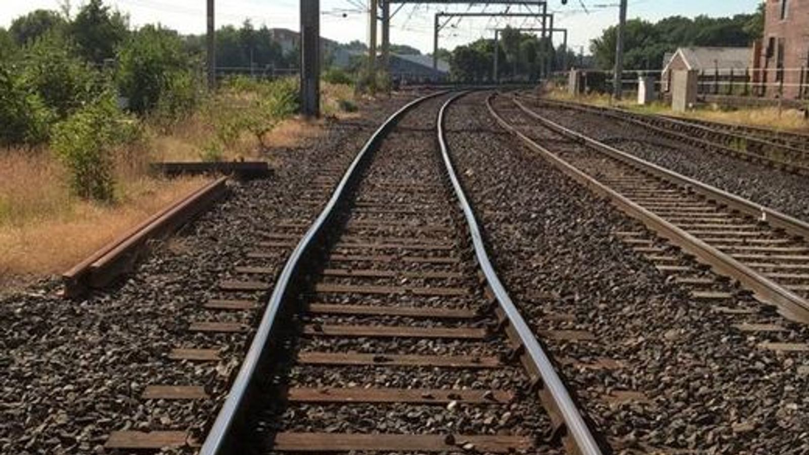 Heatwave brings melting roads and 49C train track temperatures with