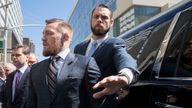 Mixed martial arts fighter Conor McGregor leaves a Brooklyn Supreme court, Thursday, June 14