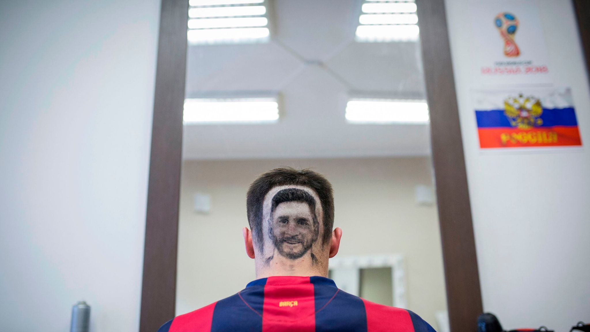 Messi hair Barber shaves player's image into fans' hair for World Cup