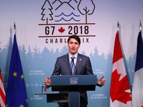 Canada&#39;s Prime Minister Justin Trudeau addresses the final news conference of the G7 summit in the Charlevoix city of La Malbaie, Quebec, Canada