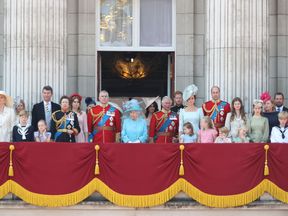 Meghan joins the family on the balcony