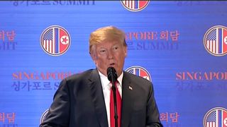 Donald Trump gives a news conference after his summit with Kim Jong Un