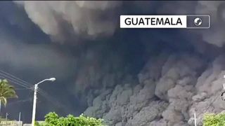 People flee as volcanic ash cloud towers above them in Guatemala