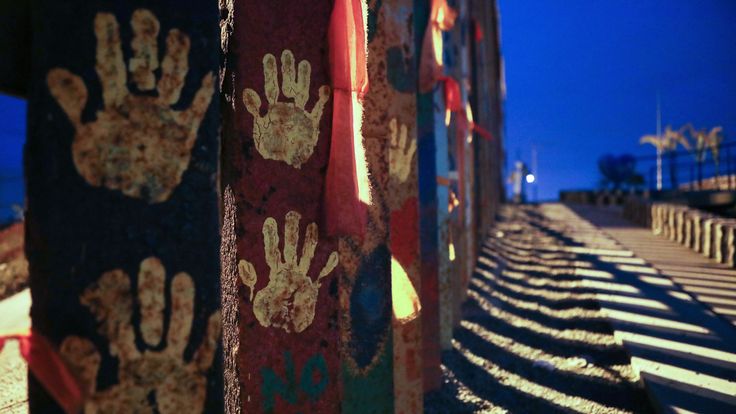 Handprints are displayed on the fence at Friendship Park on the Mexico side of the U.S.-Mexico border fence