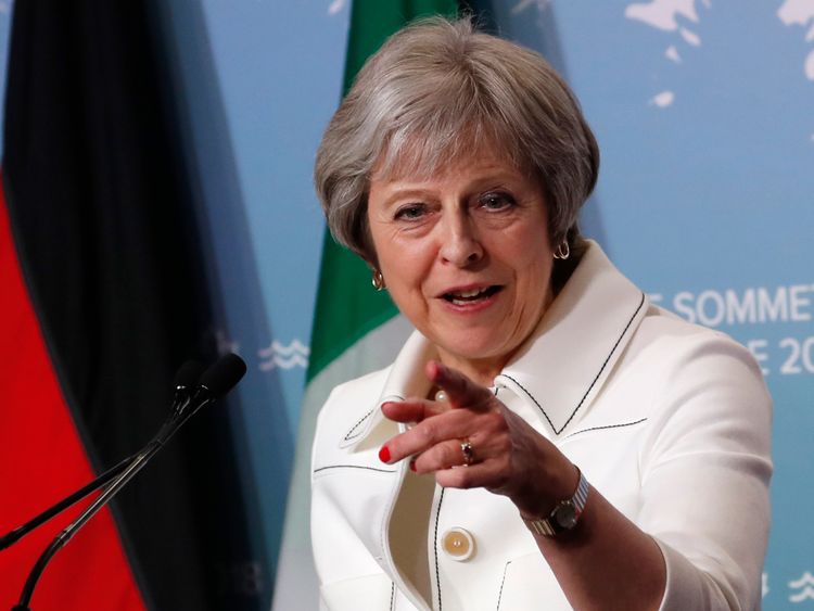 Britain&#39;s Prime Minister Theresa May addresses the final news conference of the G7 summit in the Charlevoix city of La Malbaie, Quebec, Canada, June 9, 2018