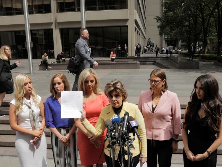 Attorney Gloria Allred holds the letter sent to the NFL on behalf of several former Houston Texans cheerleaders 