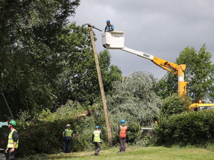 ESB Networks crews working to restore power to homes near Naas in Co Kildare after Storm Hector 