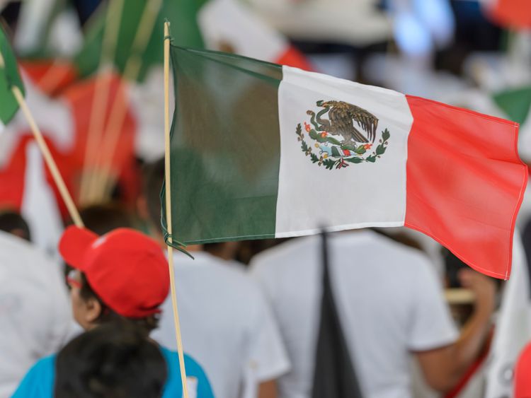 SALTILLO, MEXICO - JUNE 27: A mexican flag waves during the final event of 2018 Election Campaign of Presidential cancidate Jose Antonio Meade at Parque Las Maravillas on June 27, 2018 in Saltillo, Mexico.