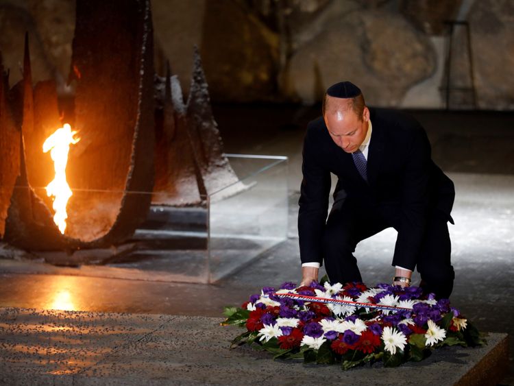 William lays a wreath during a ceremony commemorating the six million Jews killed by the Nazis