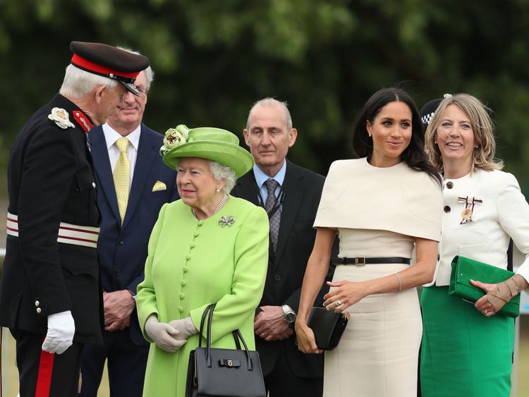 The Queen appeared to go green for Grenfell during the visit