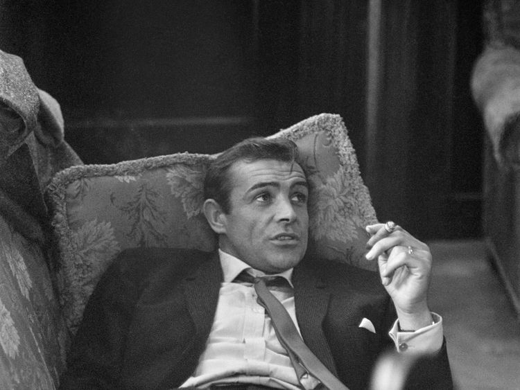 28th October 1963: British actor Sean Connery lounges on a sofa with a cigarette. He is in London during filming of the thriller 'Woman of Straw' with Gina Lollobrigida. (Photo by Bob Haswell/Express/Getty Images) 