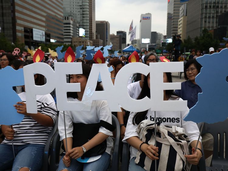 South Korean activists participate in a rally to support of the U.S. and North Korea summit on June 9, 2018