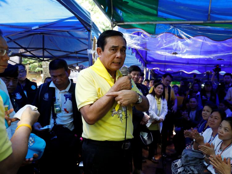 Thailand&#39;s Prime Minister Prayut Chan-o-cha speaks as he visits families anxious for news