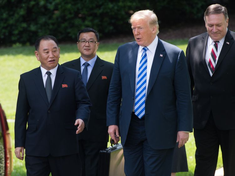 US President Donald Trump speaks with North Korean Kim Yong Chol (L) on the South Lawn of the White House on June 1, 2018 in Washington, DC