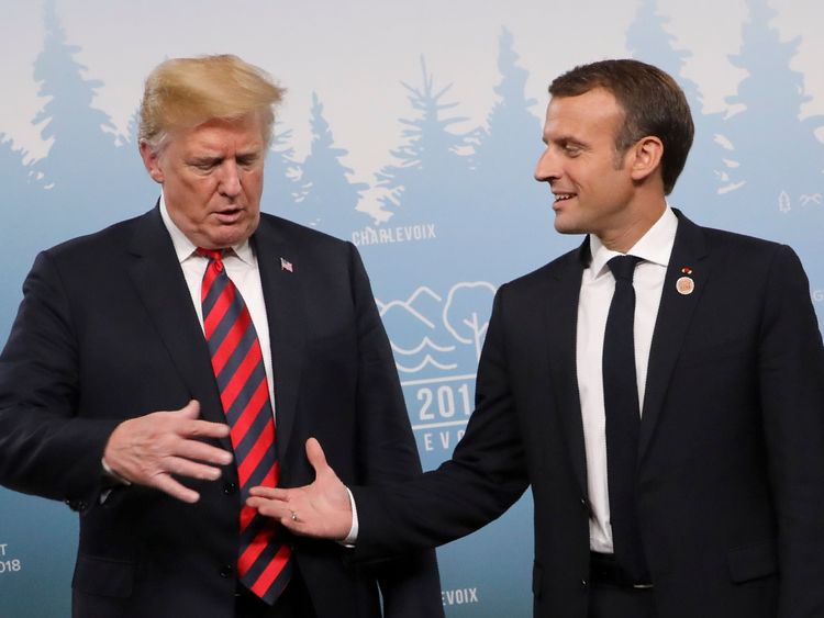Trump looks warily at Macron's out-stretched hand