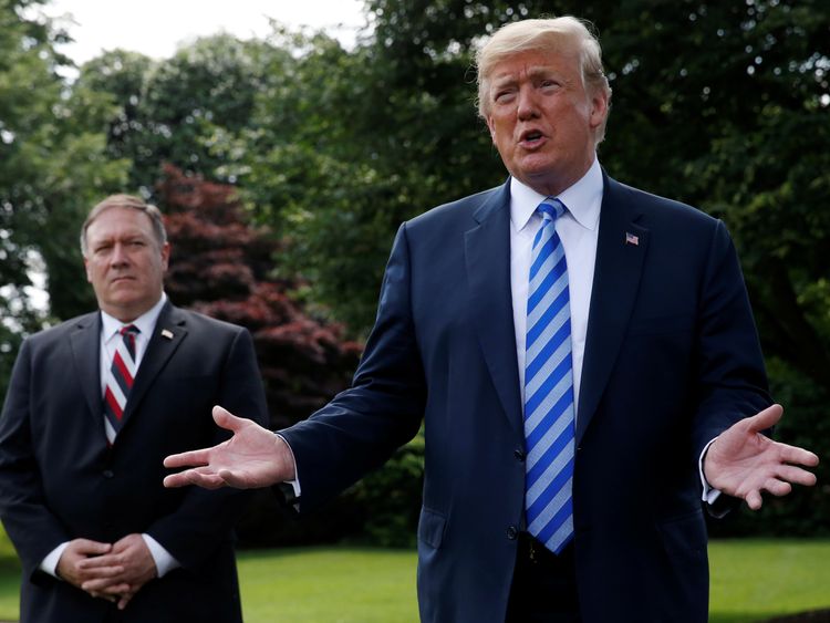U.S. President Donald Trump talks with the media as U.S. Secretary of State Mike Pompeo looks on after a meeting with North Korean envoy Kim Yong Chol at the White House