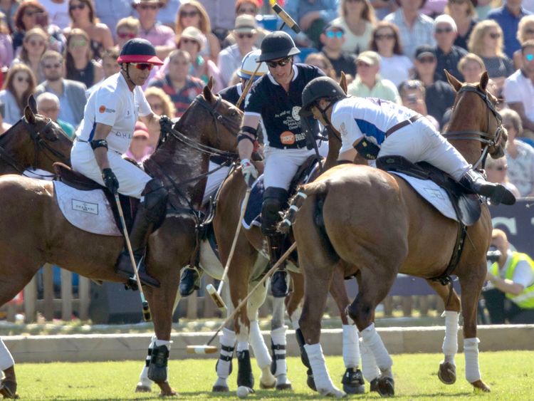 The Duke of Cambridge  (centre) takes part in the Maserati Royal Charity Polo Trophy