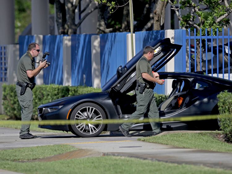 Investigators surround the car in which XXXTentacion was shot                                                                                                                                      