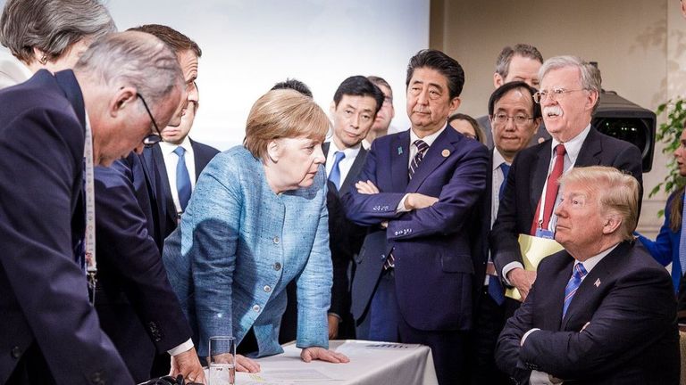 A photo shared on Angela Merkel&#39;s official Instagram account hints at tension among G7 leaders