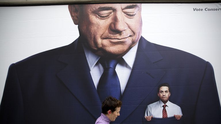 A lorry displaying a Conservative party poster which pictures Labour Party Leader Ed Miliband in the pocket of former Scottish First Minister Alex Salmond parked outside the Labour Party&#39;s Spring event in Birmingham, central England on March 14, 2015. 