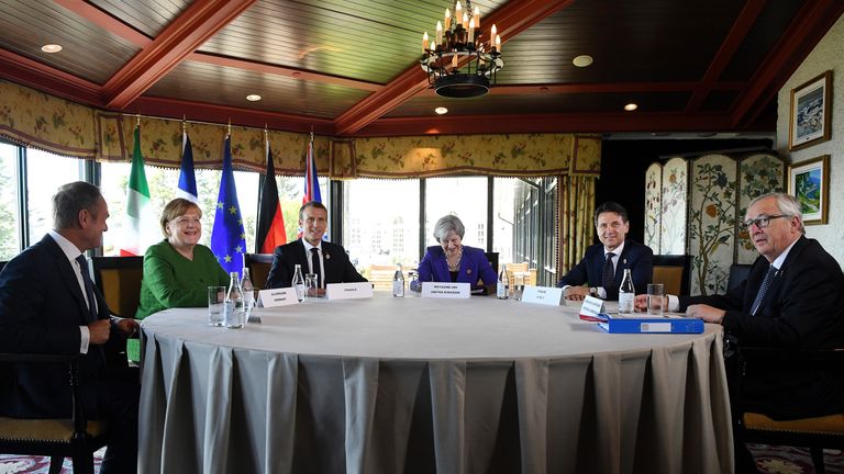 European Council president Donald Tusk, German Chancellor Angela Merkel, French President Emmanuel Macron, British Prime Minister Theresa May, Italian Prime Minister Giuseppe Conte and President of the European Commission Jean-Claude Juncker on day one of the G7 meeting