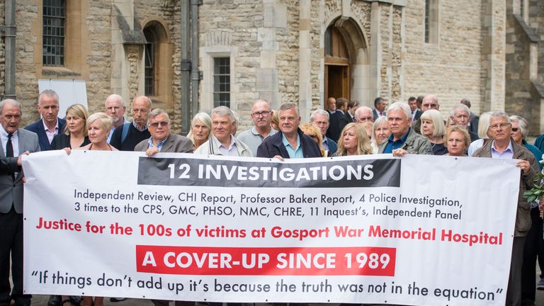 Members of the families of people who died at Gosport War Memorial Hospital outside Portsmouth Cathedral 