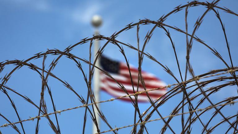 Razor wire tops the fence of the US prison at Guantanamo Bay, also known as &#39;Gitmo&#39;