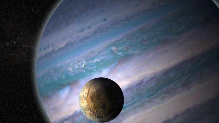 Credit: Artist&#39;s illustration of a potentially habitable exomoon orbiting a giant planet in a distant solar system. Credit: NASA GSFC: Jay Friedlander and Britt Griswold.