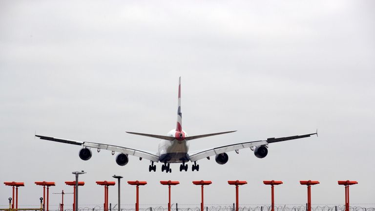 A plane lands at Heathrow Airport 