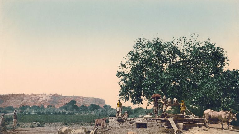 Local people with their cattle at a well in Gwalior Fort near Gwalior, Madhya Pradesh, India, circa 1900. Vintage colour photochrom. (Photo by Photoglob Co./Hulton Archive/Getty Images)

