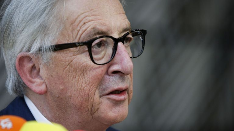 President of the European Commission Jean-Claude Juncker speaks to journalists as he arrives to take part in an European Union leaders&#39; summit focused on migration, Brexit and eurozone reforms on June 28, 2018 at the at the Europa building in Brussels. - The two-day meeting in Brussels is expected to be dominated by deep divisions over migration, with German Chancellor saying the issue could decide the fate of the bloc itself.