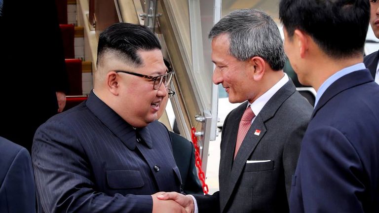 Singapore&#39;s Foreign Minister Vivian Balakrishnan welcomes North Korean leader Kim Jong Un on his arrival in Singapore, June 10, 2018. Pic: Ministry of Communications and Information