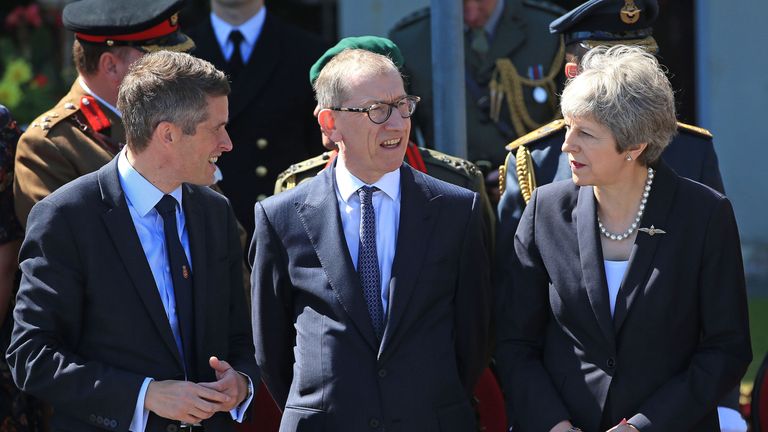 Gavin Williamson (L) has reportedly clashed with Mrs May over defence spending