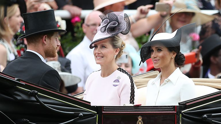 The Duchess of Sussex sat opposite her husband