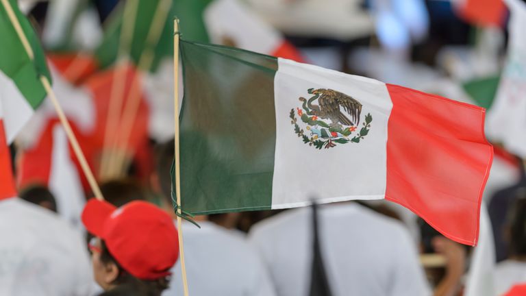 SALTILLO, MEXICO - JUNE 27: A mexican flag waves during the final event of 2018 Election Campaign of Presidential cancidate Jose Antonio Meade at Parque Las Maravillas on June 27, 2018 in Saltillo, Mexico.