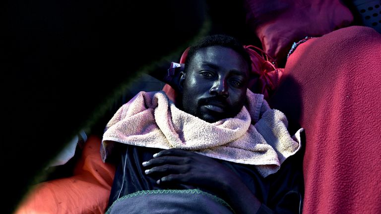 A migrant pictured on board the Aquarius vessel on its way to Valencia