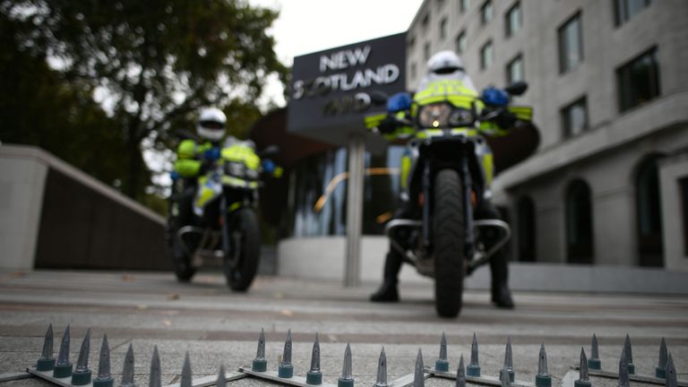 Metropolitan Police officers demonstrate a new device aimed at combating moped enabled crimes, following a briefing at New Scotland Yard in London