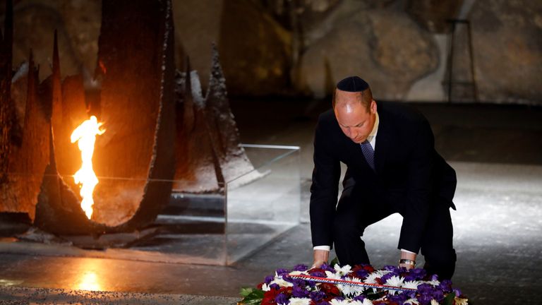 William lays a wreath during a ceremony commemorating the six million Jews killed by the Nazis 