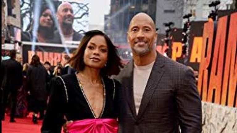 Johnson and co-star Naomie Harris on the red carpet