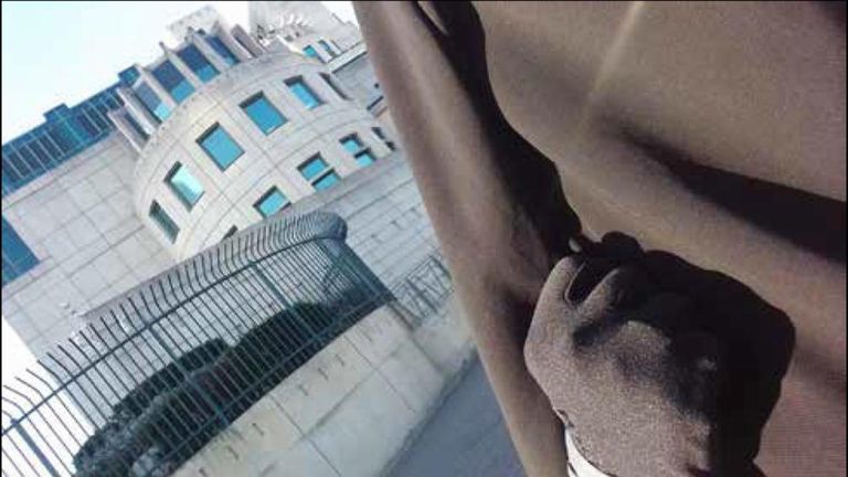 Safaa Boular took a selfie with a clenched fist at the MI6 building