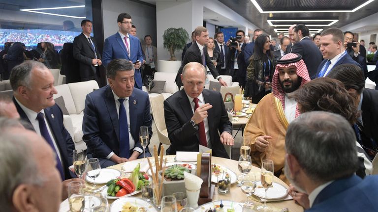 Russian President Vladimir Putin, Saudi Crown Prince Mohammed bin Salman and other guests at the half-time during the Russia 2018 World Cup Group A football match between Russia and Saudi Arabia