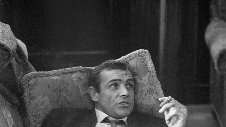 28th October 1963: British actor Sean Connery lounges on a sofa with a cigarette. He is in London during filming of the thriller 'Woman of Straw' with Gina Lollobrigida. (Photo by Bob Haswell/Express/Getty Images)
