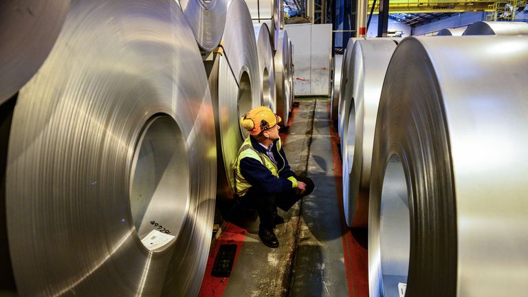 File photo dated 15/02/17 of a worker inspecting rolls of steel. Massive US tariffs on EU steel imports came into force on Friday as Britain made it clear a trans-Atlantic trade war would be bad for both sides.