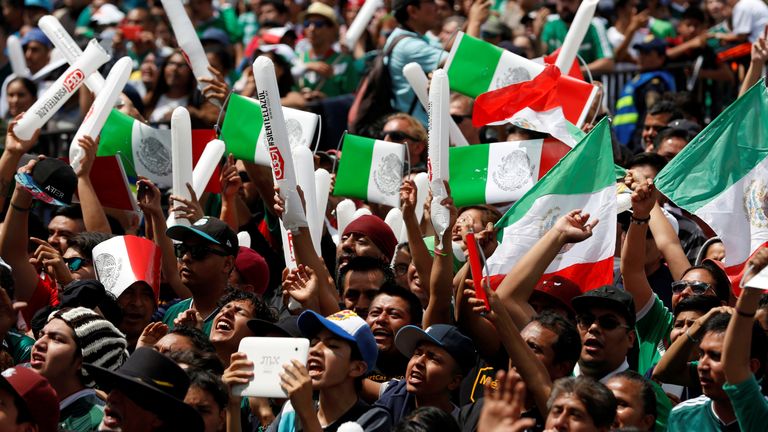 Soccer Football - FIFA World Cup - Group F - Germany v Mexico - Mexico City, Mexico - June 17, 2018 - Mexican fans celebrate at the Zocalo square