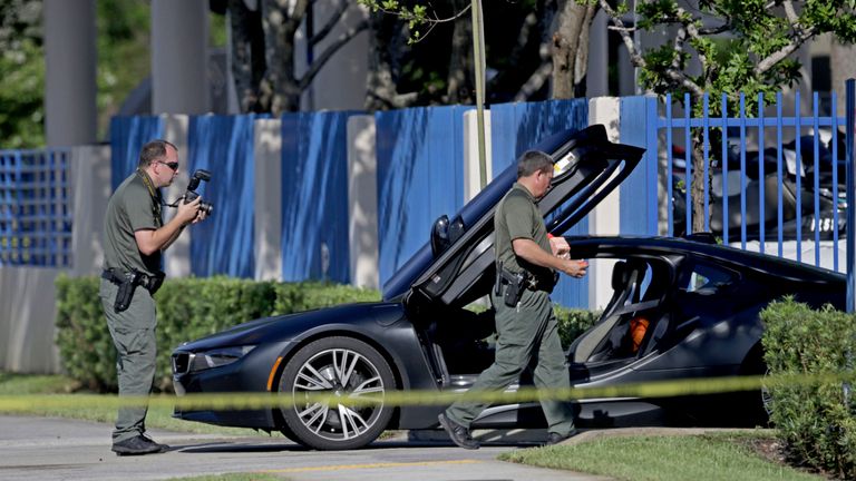 Investigators surround the car in which XXXTentacion was shot                                                                                                                                      