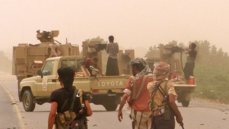 Yemeni pro-government forces gather at the south of Hodeida airport